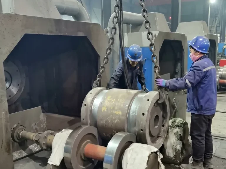 Heavy-duty horizontal centrifugal casting machine utilized for manufacturing bi-metal DURON rolling mill rolls, ensuring superior outer shell density.