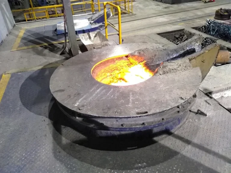 Heavy-duty horizontal centrifugal casting machine utilized for manufacturing bi-metal DURON rolling mill rolls, ensuring superior outer shell density.