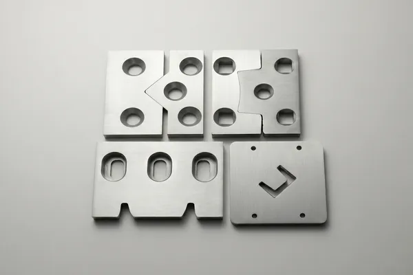 DURON customized V-shape structural shear blades for clean and controlled cutting of steel angles, channels, and sections.